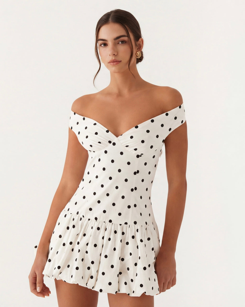 Mini a pois con scollo a cuore
