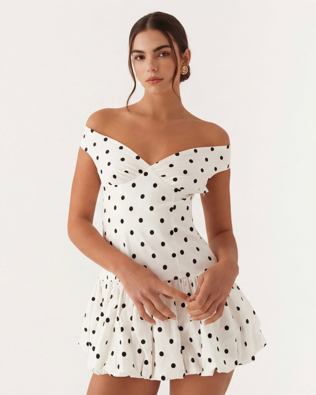 Mini a pois con scollo a cuore