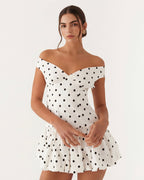 Mini a pois con scollo a cuore