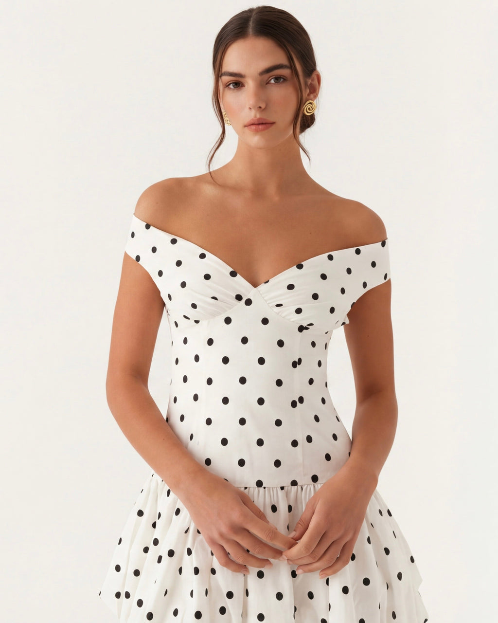 Mini a pois con scollo a cuore