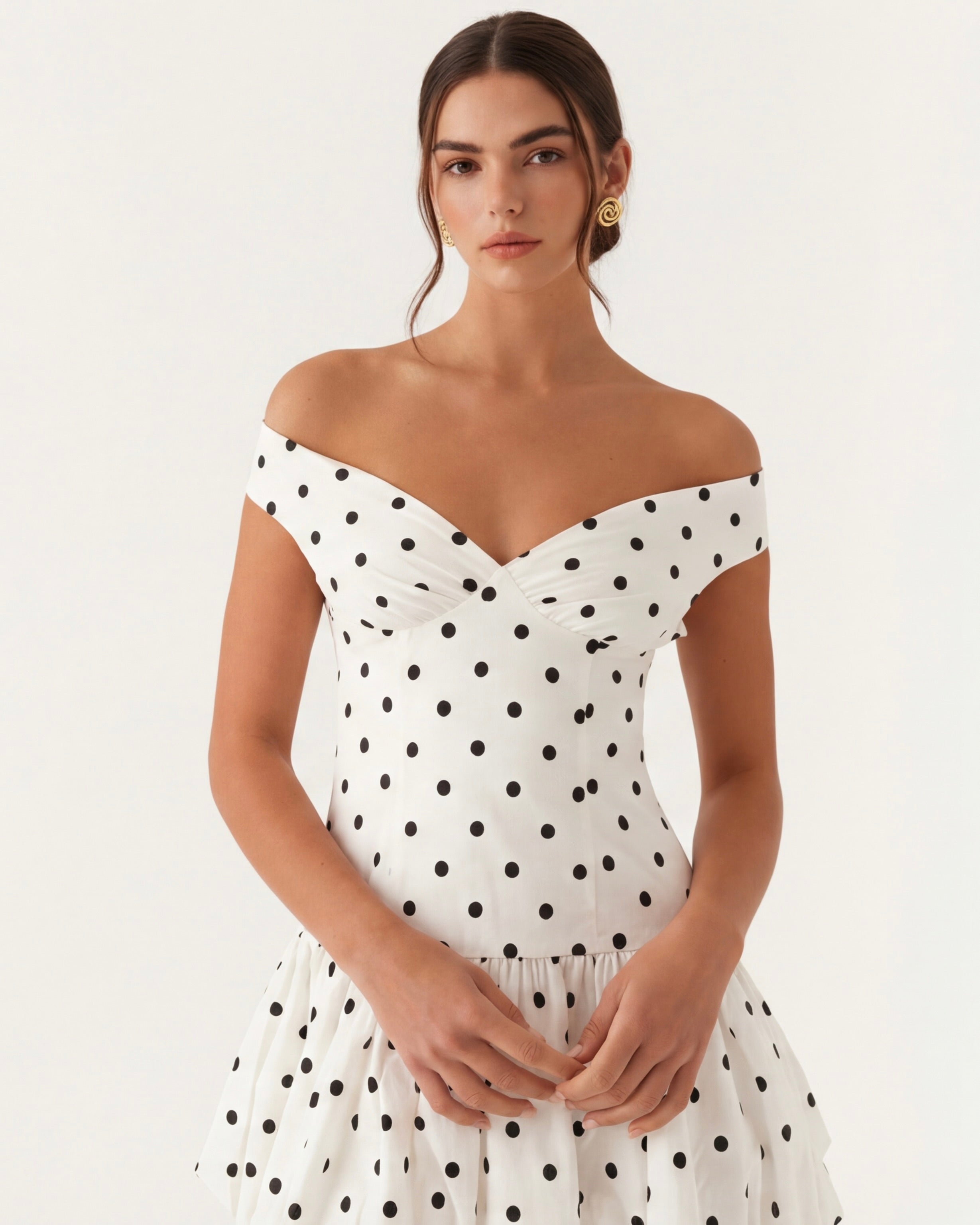 Mini a pois con scollo a cuore