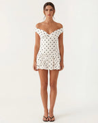 Mini a pois con scollo a cuore