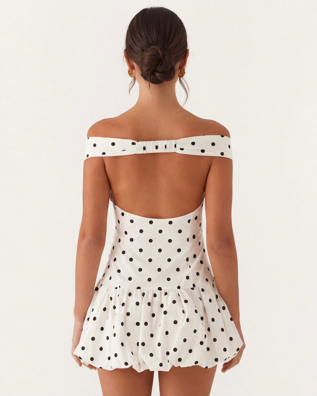 Mini a pois con scollo a cuore