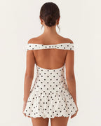 Mini a pois con scollo a cuore